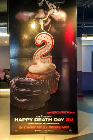 KUALA LUMPUR, MALAYSIA - FEBRUARY 18, 2019: Happy Death 2U movie poster at the cinema