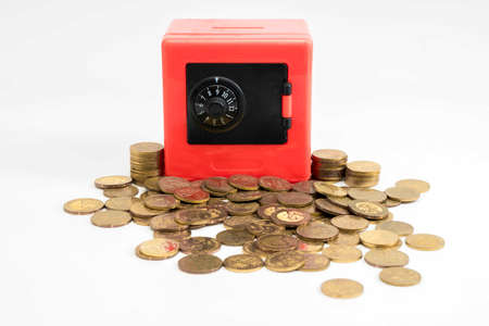 Red safe box and coinsの写真素材