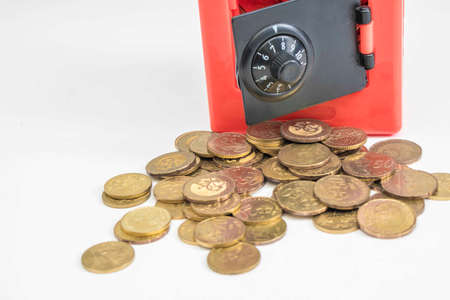 Red safe box and coinsの写真素材