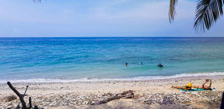 ATAURO ISLAND, EAST TIMOR - DECEMBER 8, 2018: Tourist at Atauro beach enjoying their vacationのeditorial素材