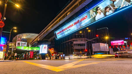 KUALA LUMPUR, MALAYSIA - JUNE 21, 2019: Traffics, billboard and pedestrian at Kuala Lumpur, Malaysiaのeditorial素材