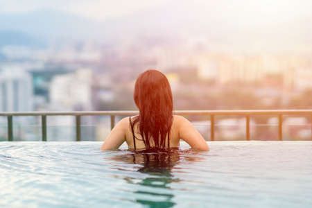 Travel Concept, Swimming pool on roof top with beautiful city view Kuala Lumpur malaysiaの写真素材