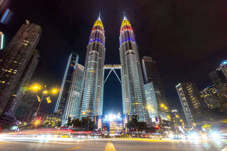 KUALA LUMPUR, MALAYSIA, AUGUST 30 2020 : KLCC Twin Tower lighted up with beautiful national flag colours celebrating independence dayのeditorial素材