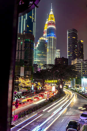 KUALA LUMPUR, MALAYSIA, AUGUST 30 2020 : KLCC Twin Tower lighted up with beautiful national flag colours celebrating independence dayのeditorial素材