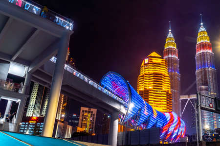 KUALA LUMPUR, MALAYSIA, AUGUST 30 2020 : KLCC Twin Tower lighted up with beautiful national flag colours celebrating independence dayのeditorial素材