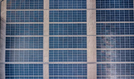 PUTRAJAYA, MALAYSIA - DECEMBER 8, 2020: Solar panel on top of high commercial building. Solar Panel...