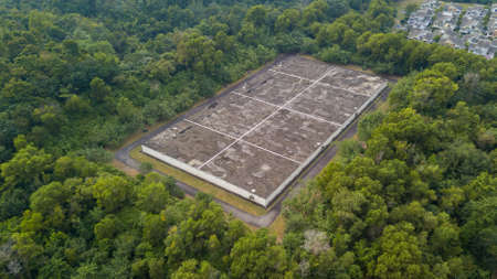 Waste management water treatment facility from birds eye view housing area