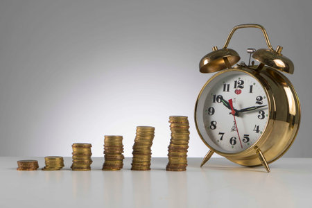 Finance concept, gold coin with alarm clock represent time is above the essence