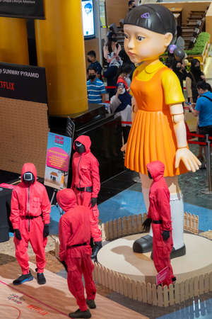 KUALA LUMPUR, MALAYSIA - 24 OCTOBER, 2021 : Squid Game at the roadshow for the promotion of new Netflix show. Squid Game is a South Korean survival drama television seriesのeditorial素材