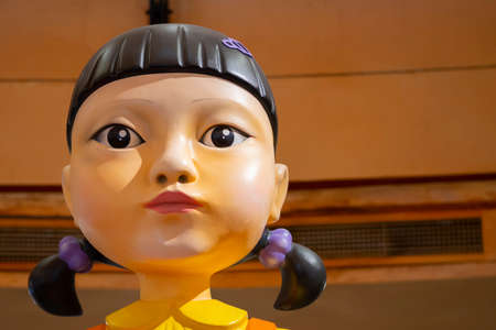 KUALA LUMPUR, MALAYSIA - 31 OCTOBER, 2021 : Giant Doll from Squid Game at the roadshow for the promotion of new Netflix show. Squid Game is a South Korean survival drama television seriesのeditorial素材