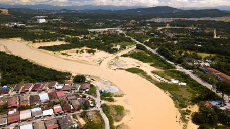 DENGKIL, MALAYSIA - DEC 20, 2021: Areal view of Dengkil district from flooding that causes damage of the infrastructure and housing area. Selective focus, contains dust and grainのeditorial素材