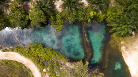 Nature environment Tadom Hill beautiful crystal clear emerald pool during sunrise