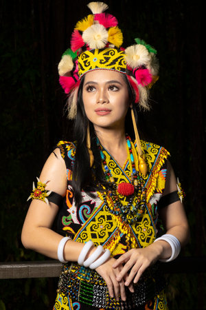 Exquisite elegance in traditional attire: A Borneo lady showcasing the beauty of her culture through...
