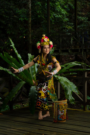 Exquisite elegance in traditional attire: A Borneo lady showcasing the beauty of her culture through her stunning traditional clothingの写真素材