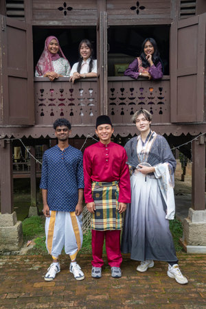 Group of Malaysian student wearing traditional cloth for festival celebrationの写真素材