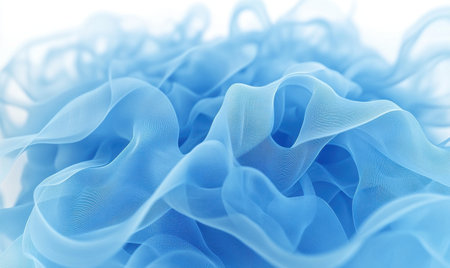 Blue fabric swirls, textile texture, close-up, soft background, design elementの素材