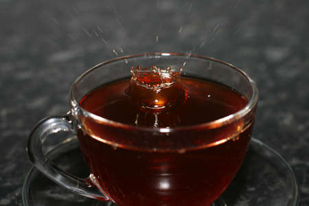 Splashes of black teaの写真素材