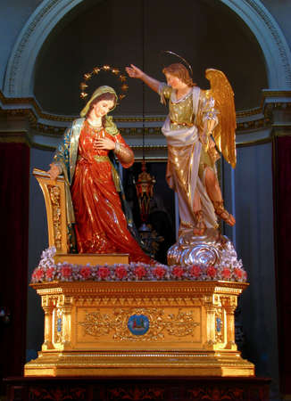 The statue of The Annunciation of Our Lord Jesus to The Blessed Virgin Mary by the Angel Gabriel displayed in Tarxien, Malta のeditorial素材