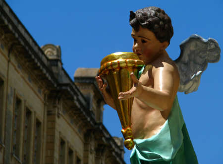 A decorative angel embellishing a street in Marsa, Malta during the feast of The Most Holy Trinity 