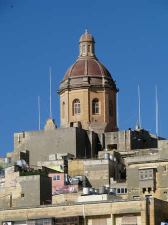 The dome of a church in Vittoriosa, Malta.の写真素材