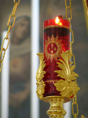 A lamp in front of a painting in Saint Paul s Bay, Malta の写真素材