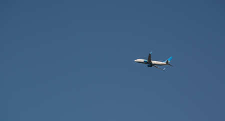 Airplane in the blue sky and cloud