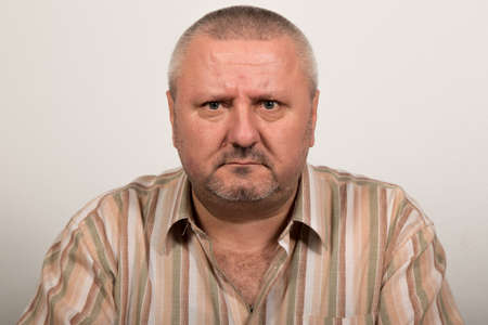 Facial expression of an angry man