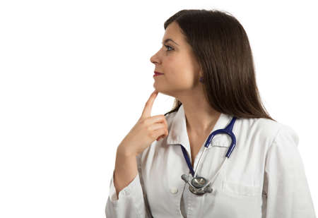 Closeup portrait of friendly, smiling confident female doctor, healthcare professional isolated on white background.の写真素材