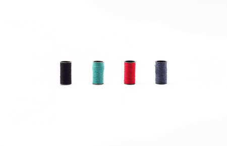 Colorful thread over white backgroundの写真素材