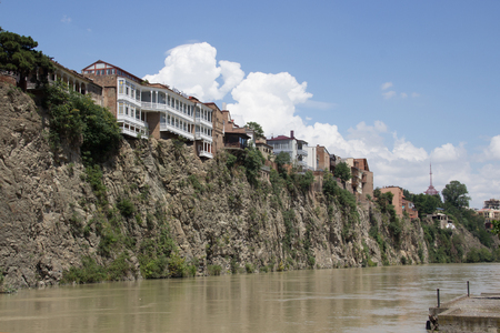 Houses on the edge of a cliff above the river Kura. Tbilisi, the historic city center.のeditorial素材
