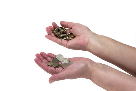 A small palm of coins in the hands of a pensioner