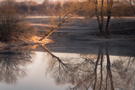 A frosty dawn in the quiet bay of the Nerl Riverの写真素材