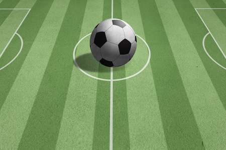 soccer ball on green grassの写真素材