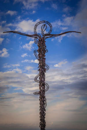 MADABA, JORDAN - December, 2018 : The Staff of Moses also called The Brazen Serpent sculpture by the artist Giovanni Fantoni on the top of Mount Neboのeditorial素材
