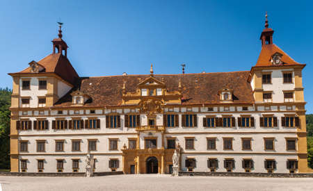 Graz, Austria August 18 2019 - Colorful sommer colors, bright blue sky in the park and Eggenberg Palace in Graz, Styria region, Austria, Europeのeditorial素材