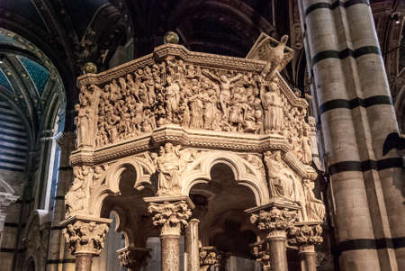 Siena Italy, April 26, 2019 -  Octagonal carousel pulpit in the Duomo dell Assuntaのeditorial素材