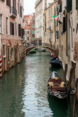 Canale (water canal) with traditional gondola boat in Venice (Venezia), Italy, Europeの写真素材
