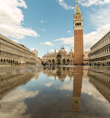 Acqua alta (high water) the exceptional tide peaks in San Marco Square, Venice, Venezia, Italy \の写真素材