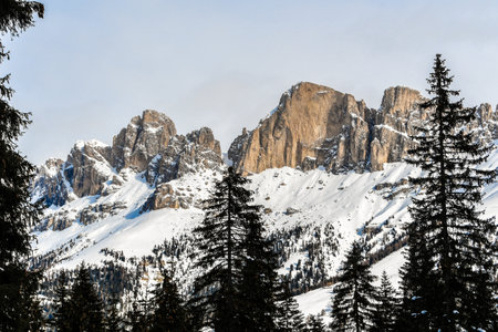 The Rosengarten-Schlern group (Gruppo Catinaccio Sciliar) and the village of Karersee or Carezza in the Dolomites in Italian Alps, SÃ¼dtirol, Alto Adigeの写真素材