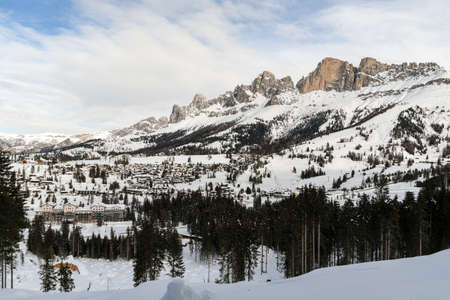 The Rosengarten-Schlern group (Gruppo Catinaccio Sciliar) and the village of Karersee or Carezza in the Dolomites in Italian Alps, SÃ¼dtirol, Alto Adigeの写真素材