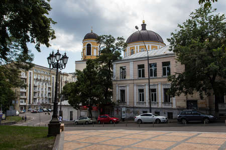 Domes of the ancient church on the street of Kyiv on a sunny day. Ukraine