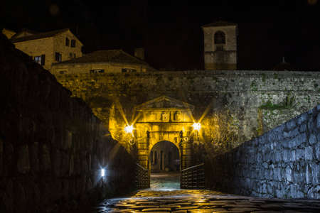 Ancient gate in the Old Town in Kotor at night. Montenegro