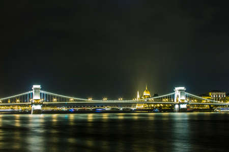 A night view of the Danube River and bridges in Budapest. Hungaryの写真素材