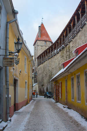 Narrow street in Old Town Tallinn in winter. Estoniaの写真素材