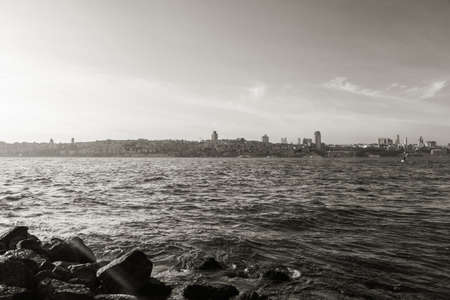 View of the Taksim district of Istanbul from the Bosphorus at sunset. Turkey