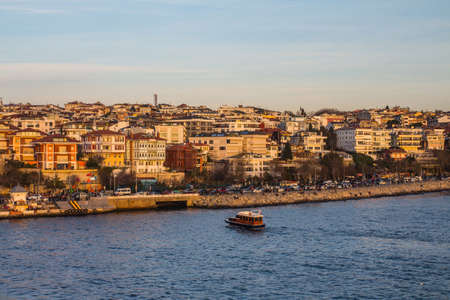Boat in the Bosphorus on the background of the city of Istanbul. Turkeyの写真素材