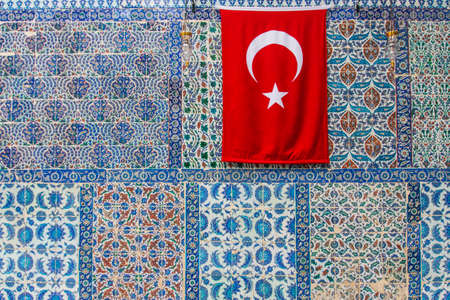 National Turkish ornaments on ceramic tiles on the wall of a mosque in Istanbul. Turkey