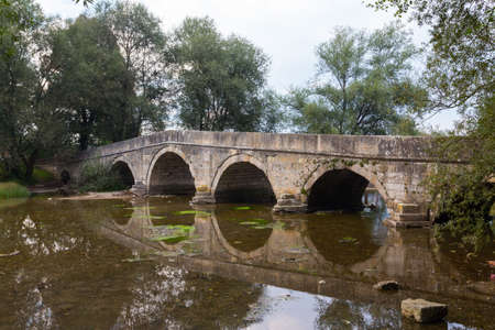 Historic stone Roman bridge in Vrelo Bosne Park near Sarajevo. Bosnia and Herzegovinaの写真素材