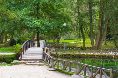 Wooden bridge in Vrelo Bosne Park in Sarajevo. Bosnia and Herzegovinaの写真素材