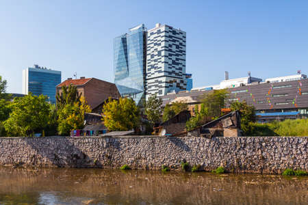 Old and abandoned buildings on the banks of the Miljacka River in Sarajevo. Bosnia and Herzegovinaのeditorial素材